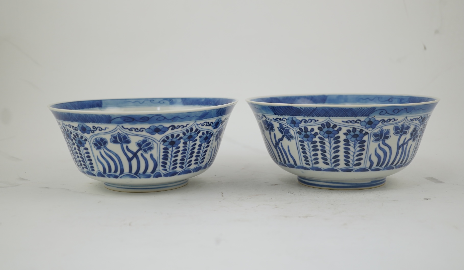 A pair of Chinese blue and white bowls, Kangxi four character mark, 19th century